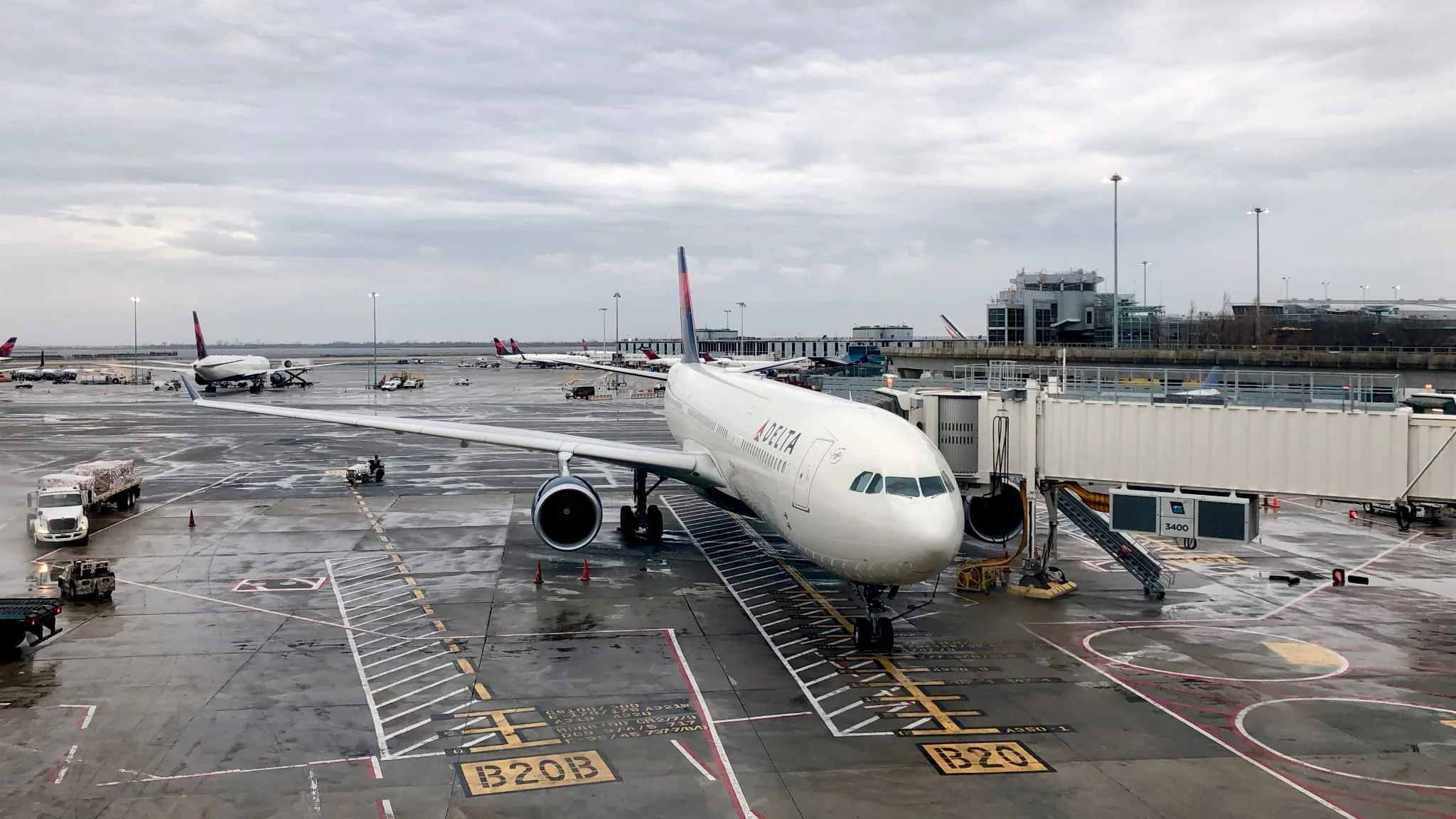A Delta airplane parked at a gate in New York.